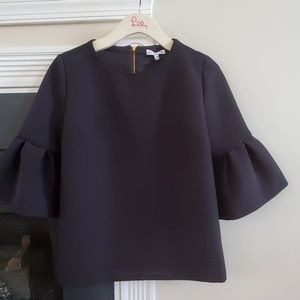 Anna Cate lined, black, bell sleeved top